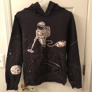 Astronaut vacuuming the stars hoodie by SoScribbly